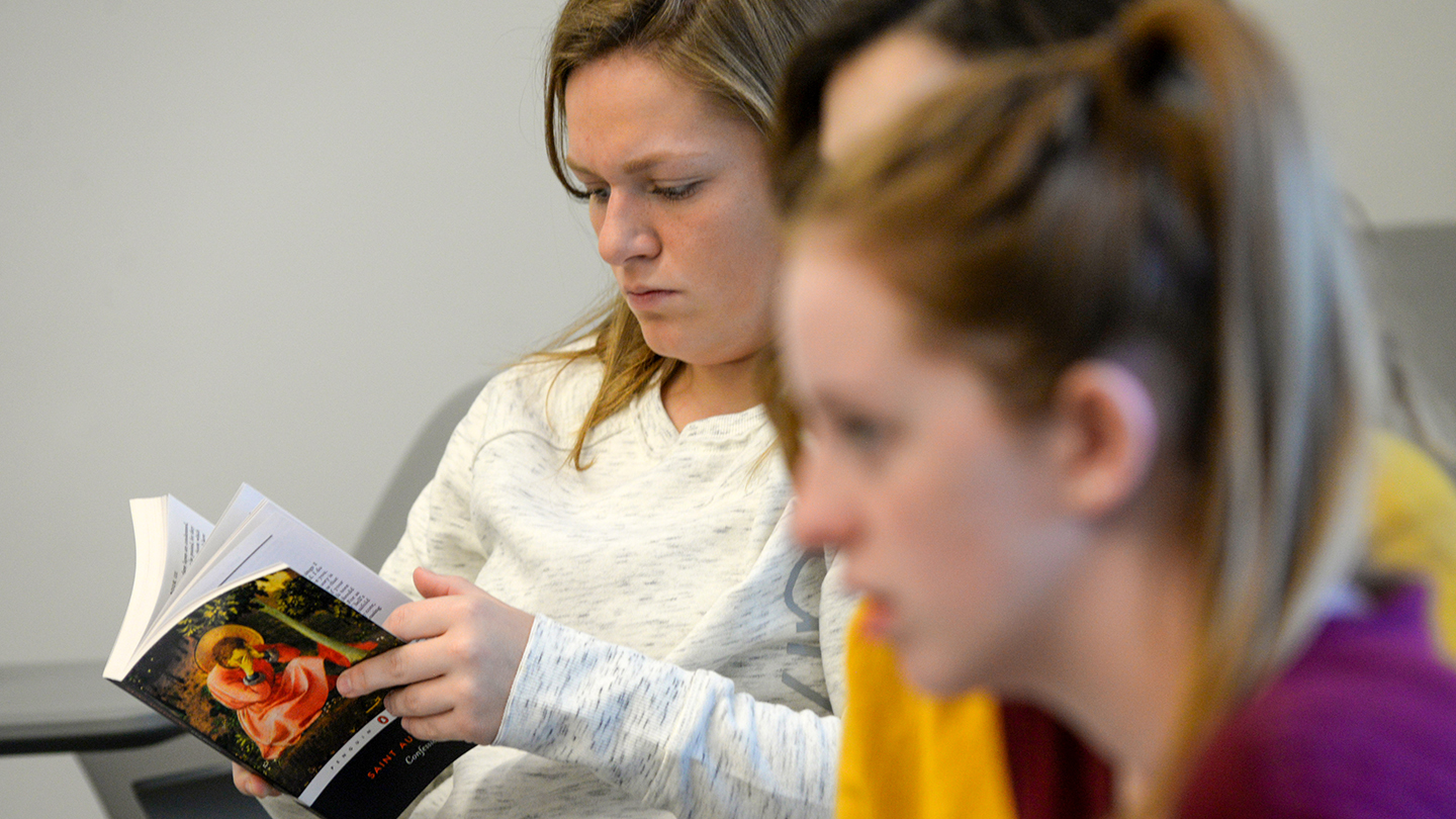 a person looking in a book
