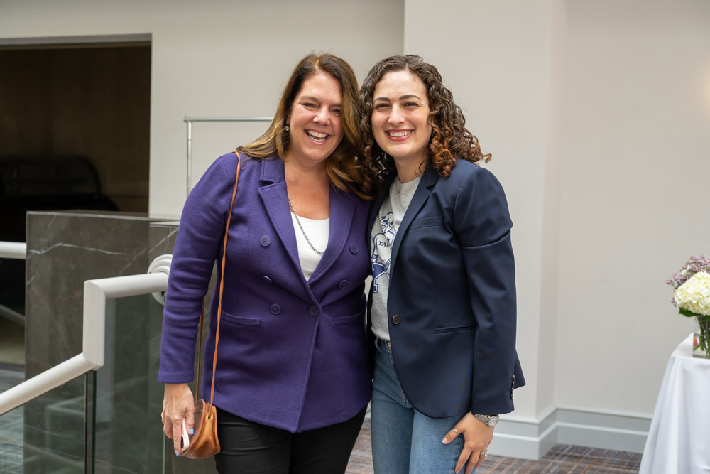 Two women smiling