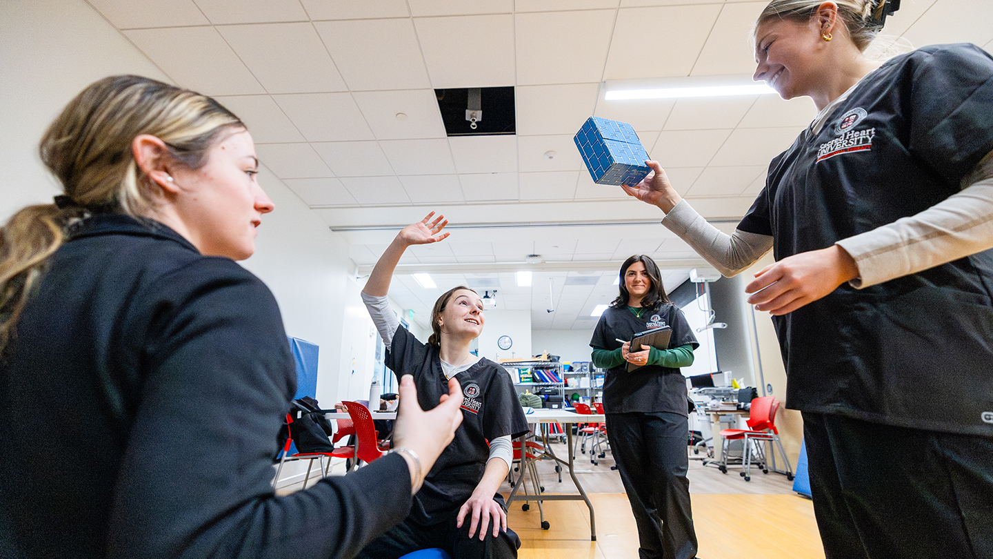 students doing an occupational therapy exercise in a lab