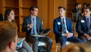 Business students sitting and talking