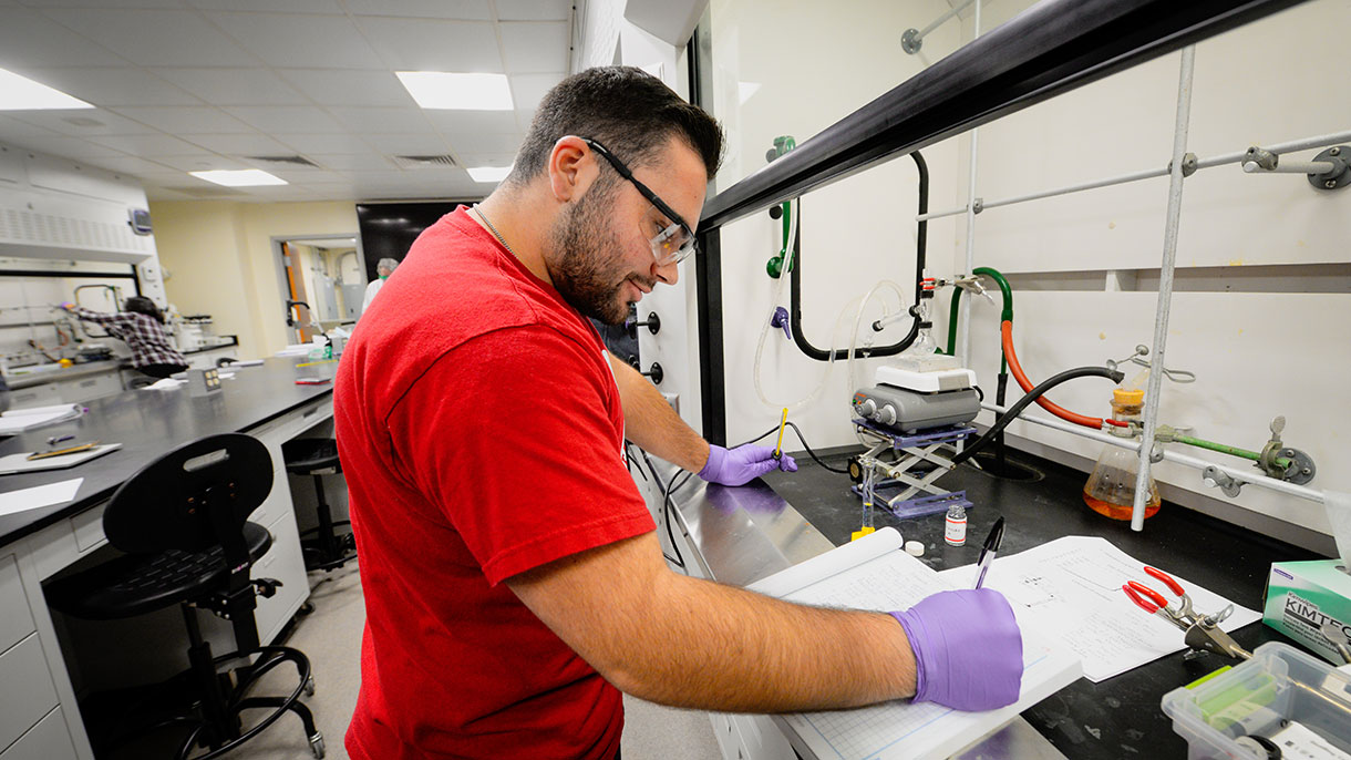 chemistry student working in the lab 