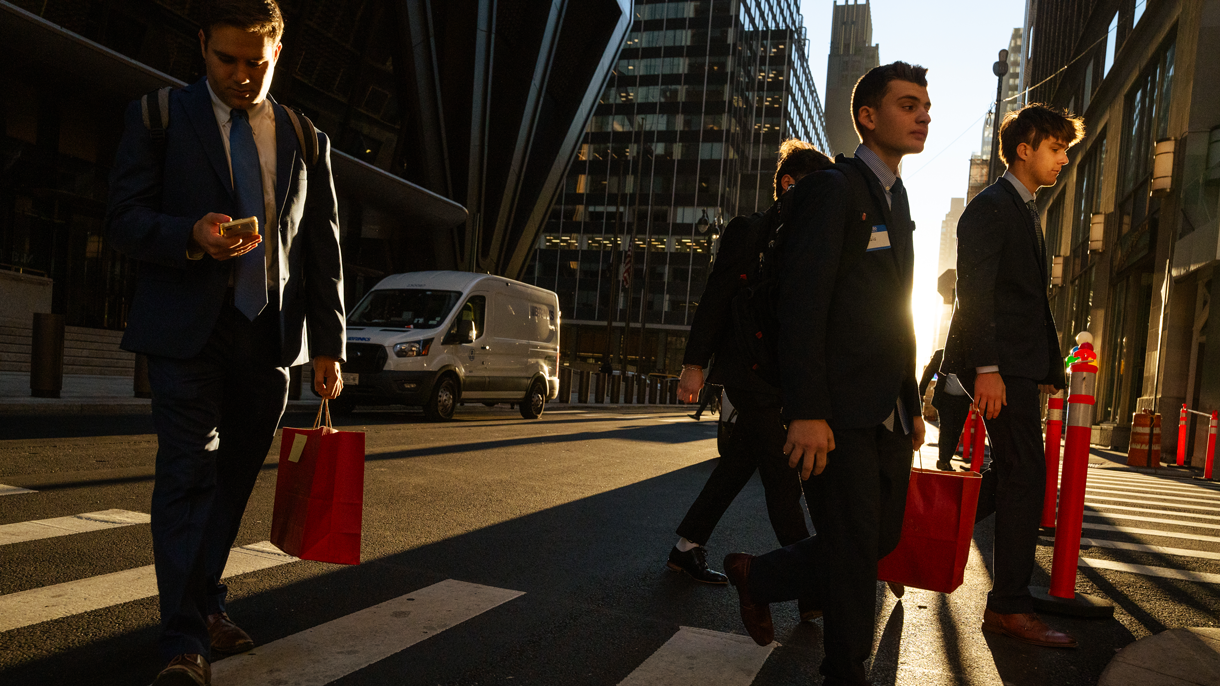 Students crossing a crosswalk in New York City