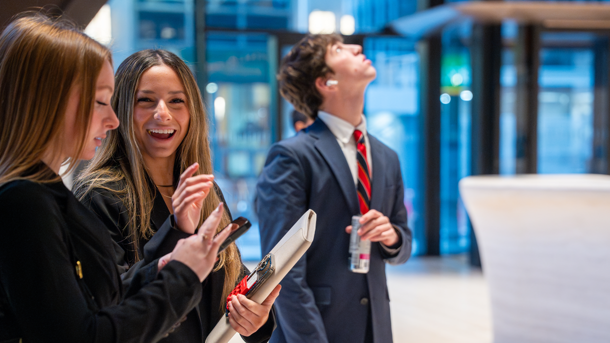 Students smiling during visit to JP Morgan Chase