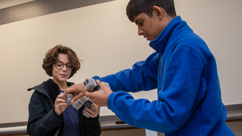 Students working together on robotics