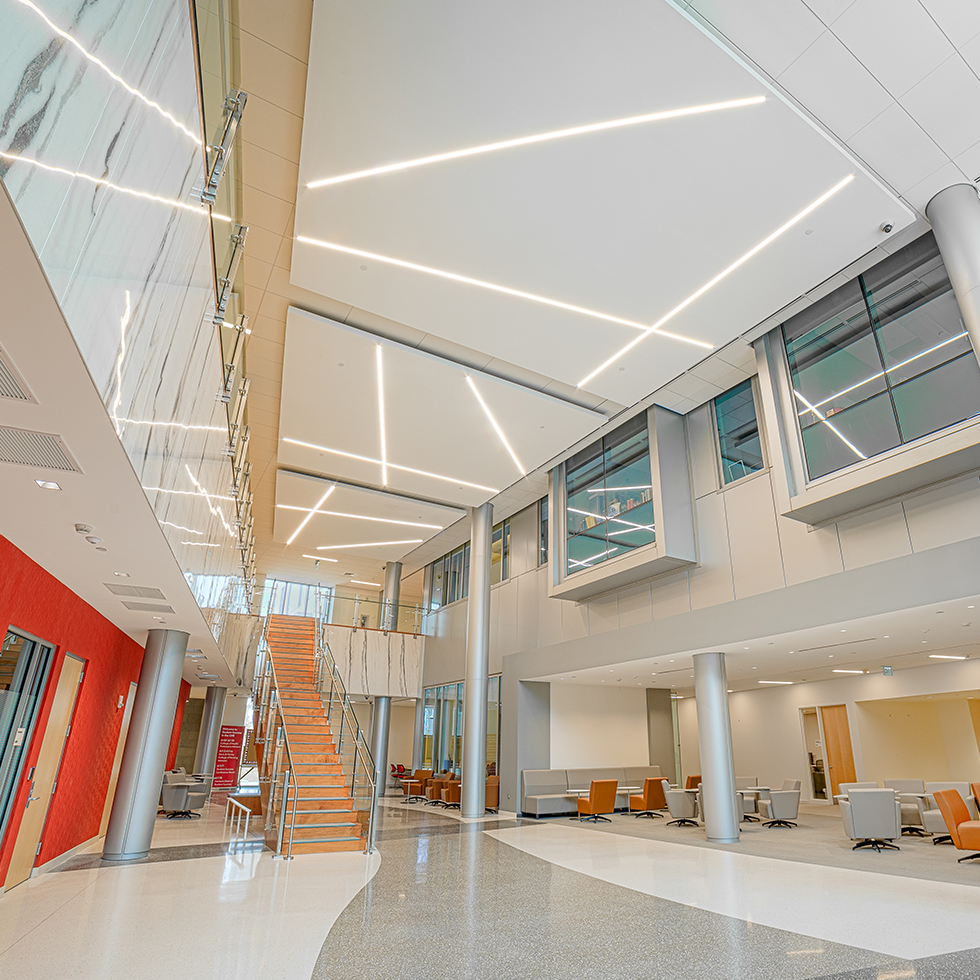 atrium area at the Center for Healthcare Education showing a staircase and seating area