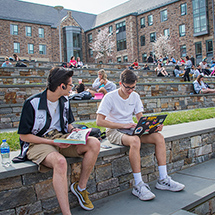 college students studying on amphitheater steps