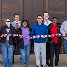 People holding paper chain