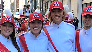 International student in marching band with friends in NYC parade