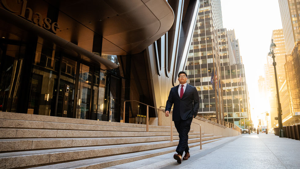 Professional walking outside in a city