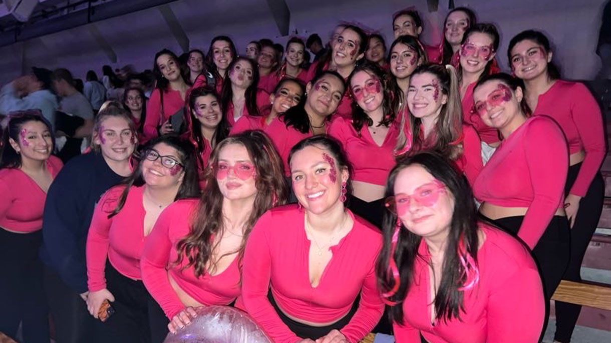 Members of Kappa Alpha Theta wearing pink at Greek Sing