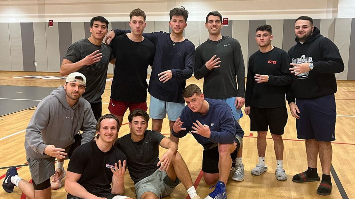 Members of Kappa Sigma on a basketball court