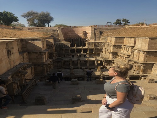 Girl looking at building
