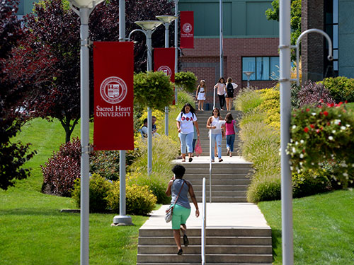 students walking on campus 