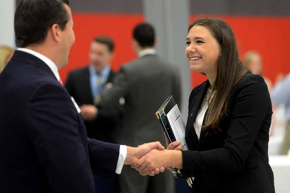 two people shaking hands