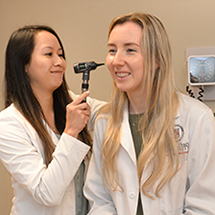 doctor of nursing practice students work in a sim lab