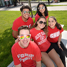 5 college students pose for a group photo