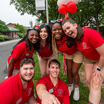six happy orientation leaders gathering for a photo