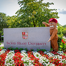 Big Red mascot by SHU entrance to campus
