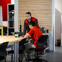 Two students working at a table