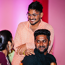 three people talking and smiling