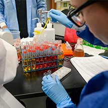 Student and test tubes