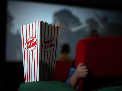 a container of movie theatre popcorn