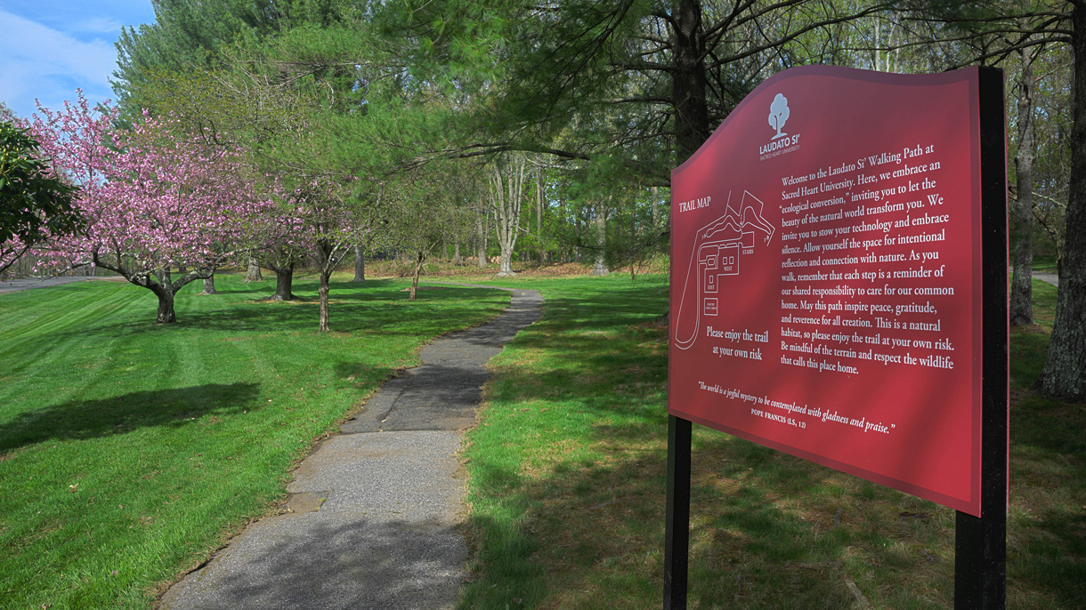 Laudato Si walking trail sign at Sacred Heart University