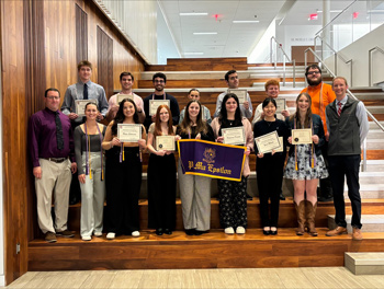 Group of students with their certificates