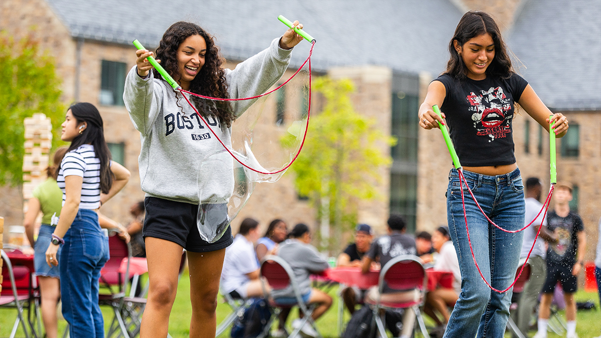 two people playing lawn games