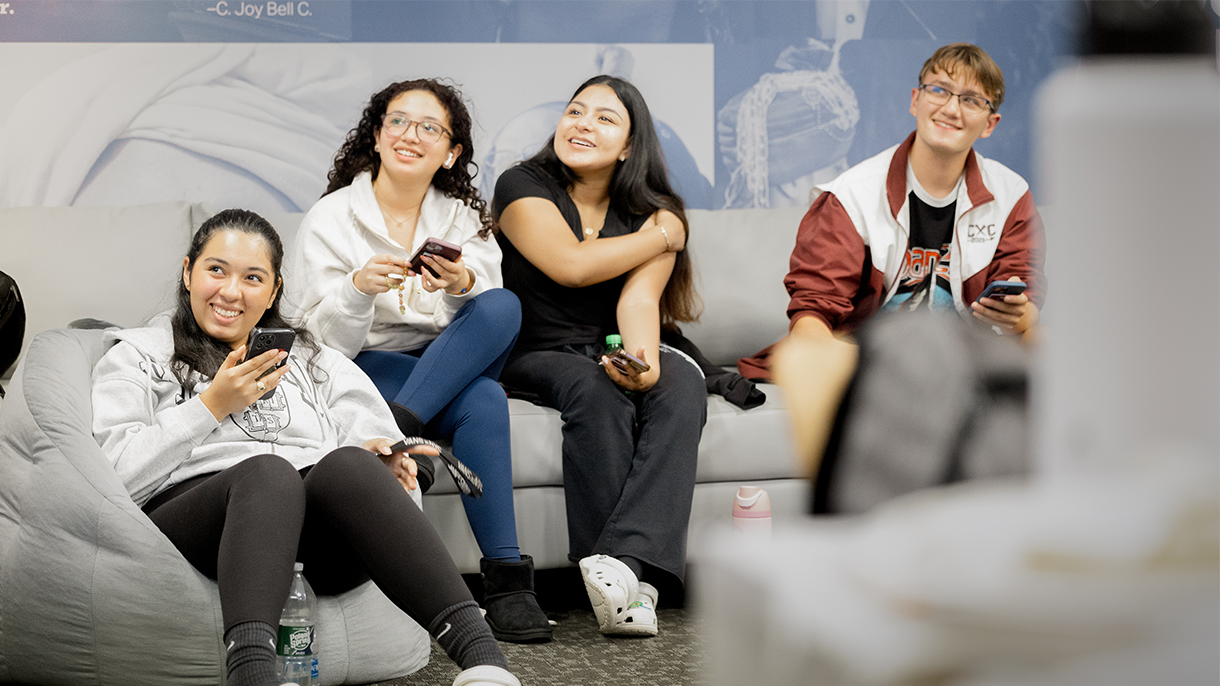 three people smiling