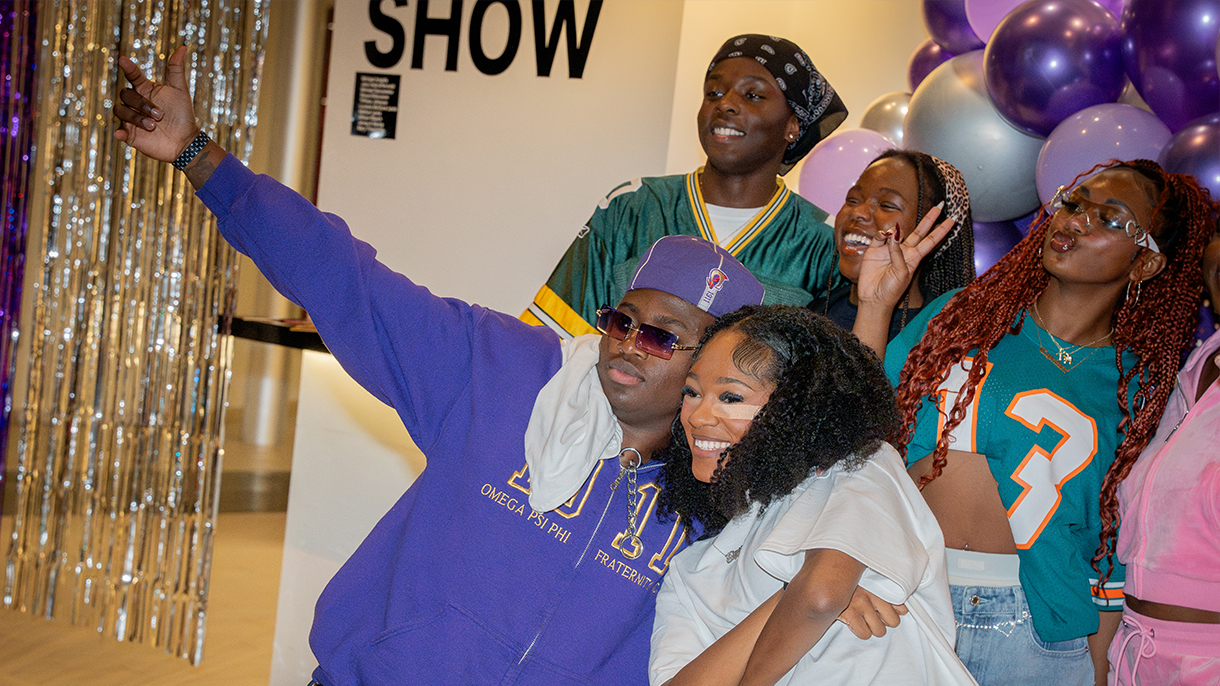 group of friends posing for a photo together