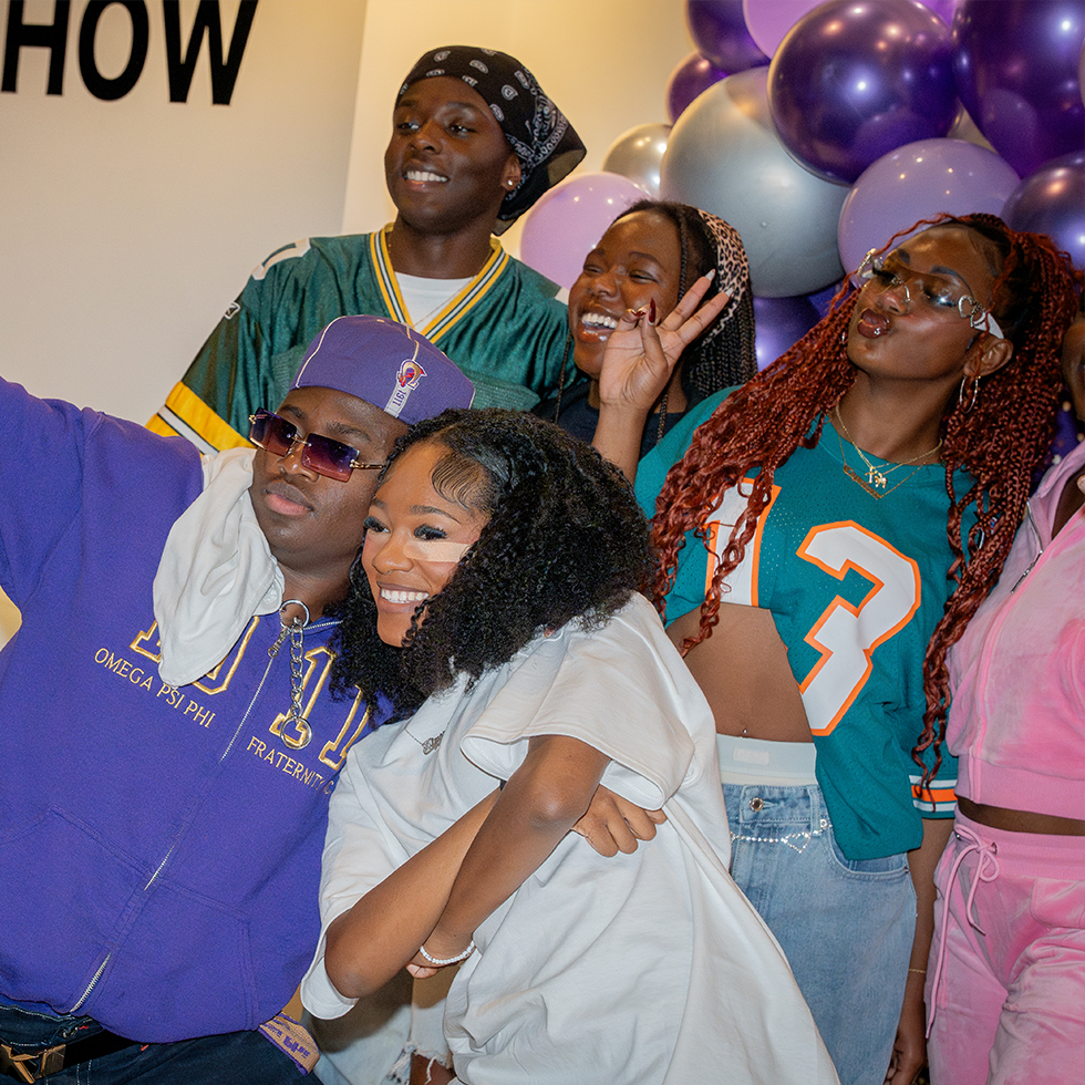 group of friends posing for a photo together