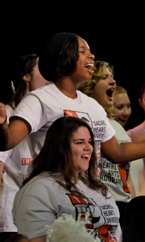 Stachakay Silvera singing in choir