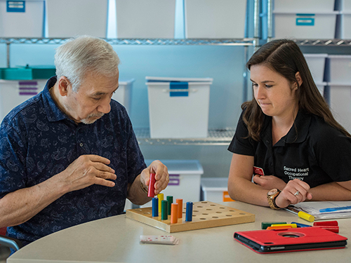 OT student with stroke patient