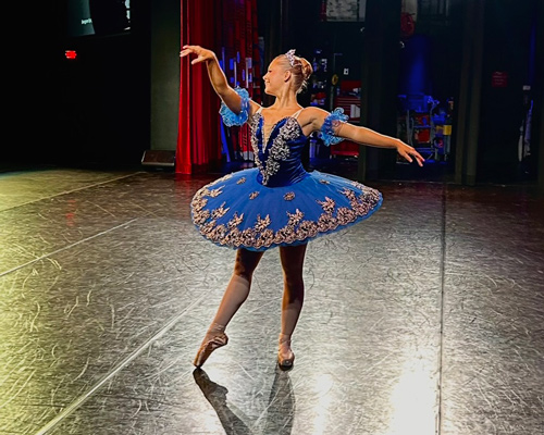 Ryann Henry dancing on stage