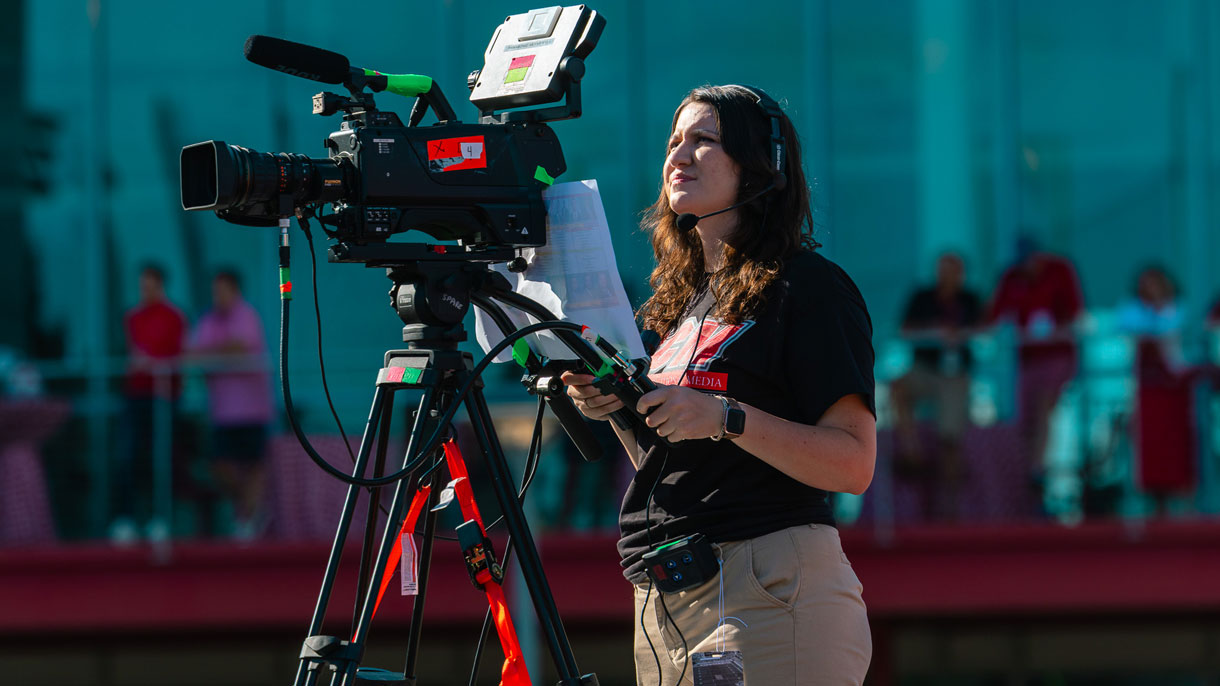 Student operating video camera