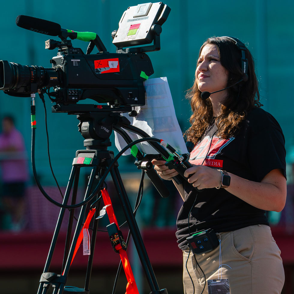 Student operating video camera