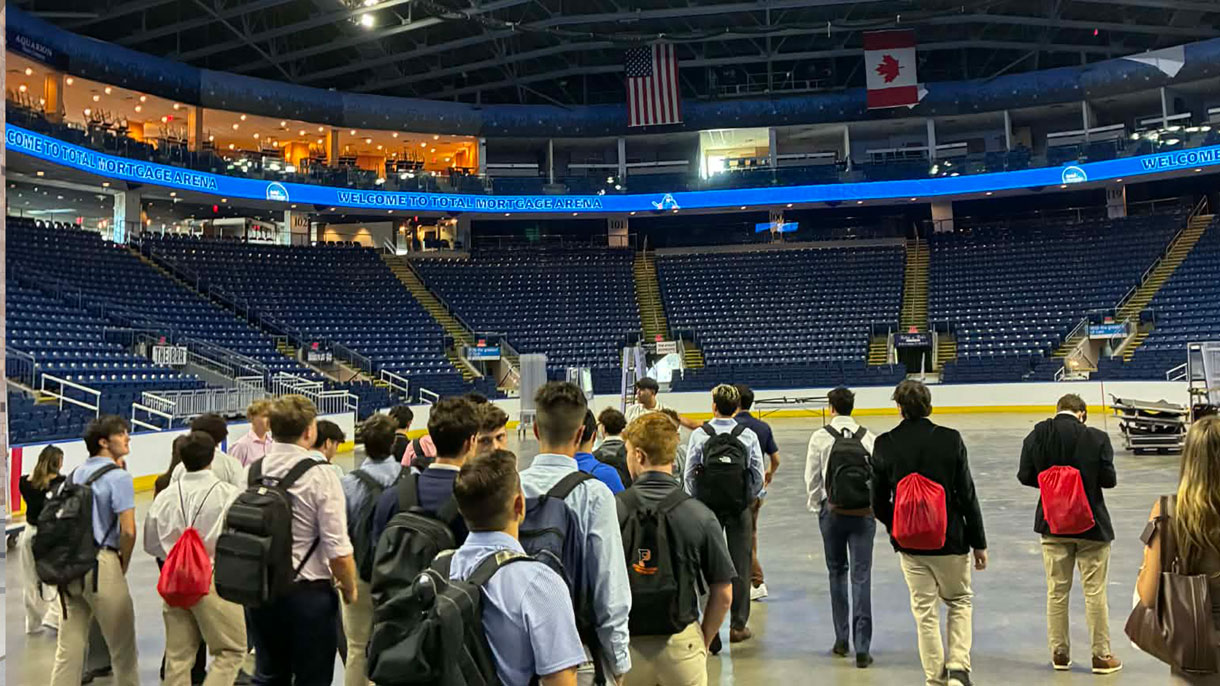 Students in an empty arena