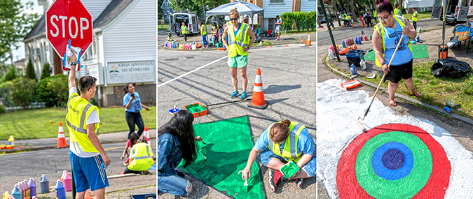 People painting the road