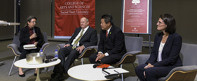 Four people sitting for an interview