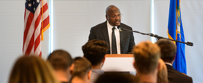 Man speaking at podium