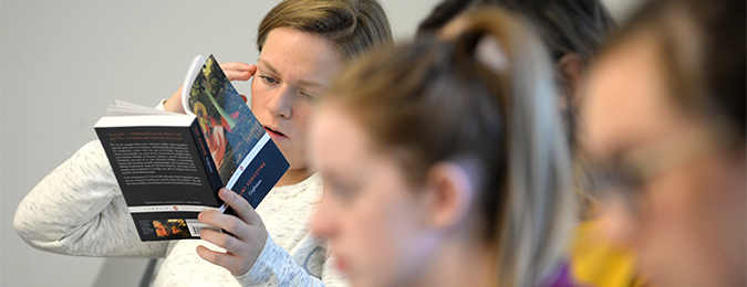 Student reading a book
