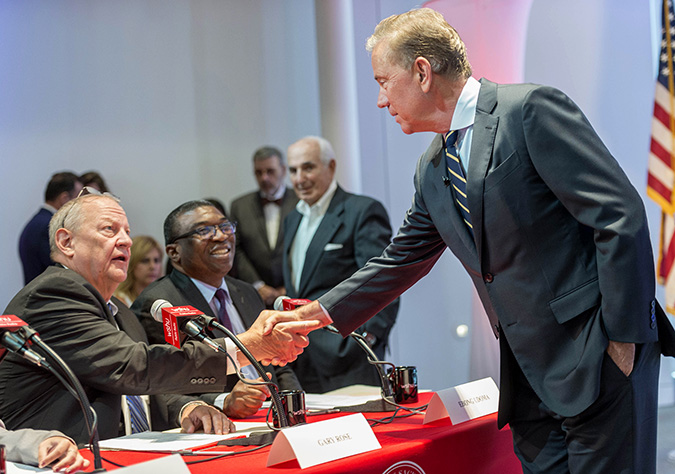 two men shaking hands