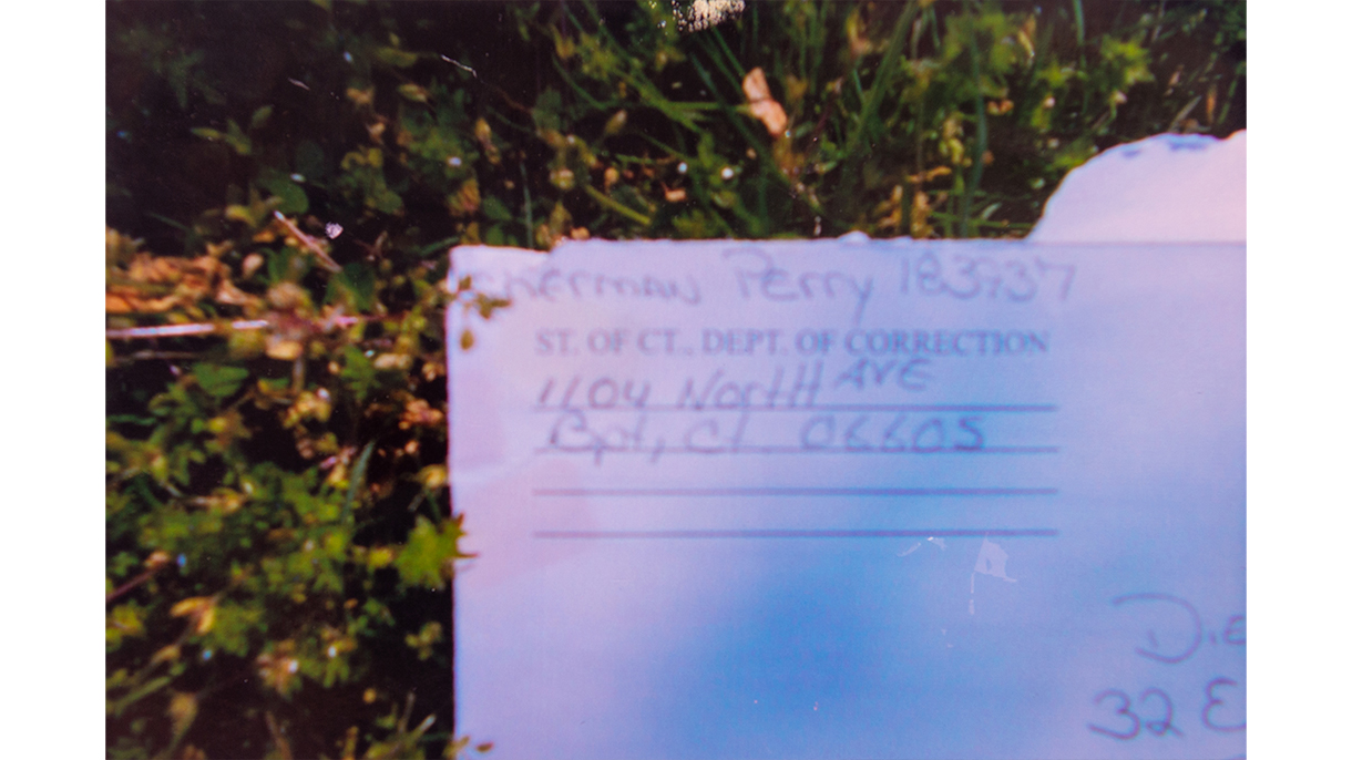 envelope showing a return address at a prison