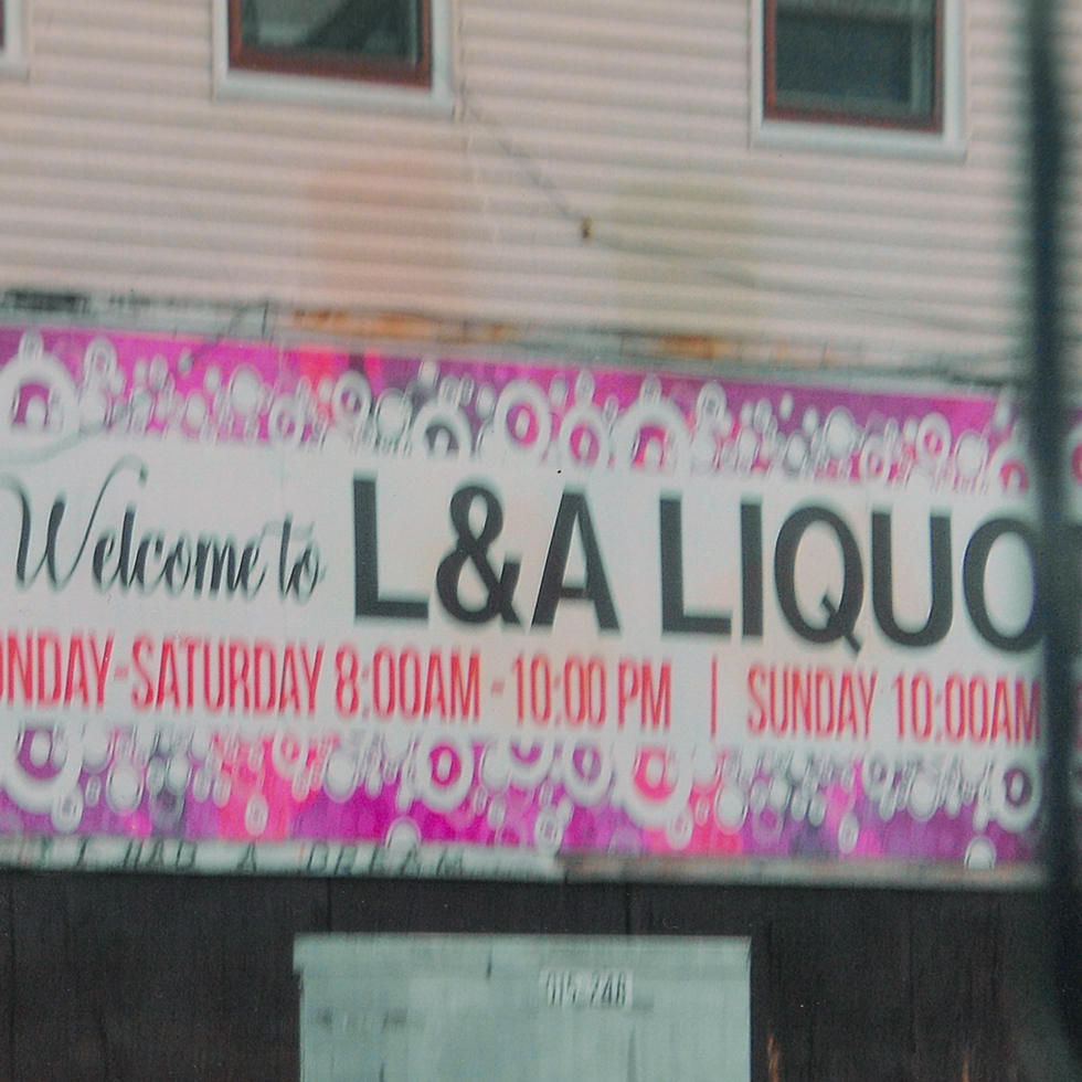 A liquor store sign