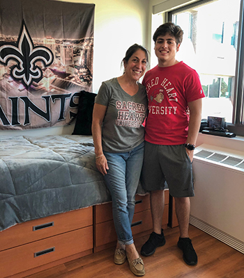 Brad Hutchison and his mom at Toussaint Hall