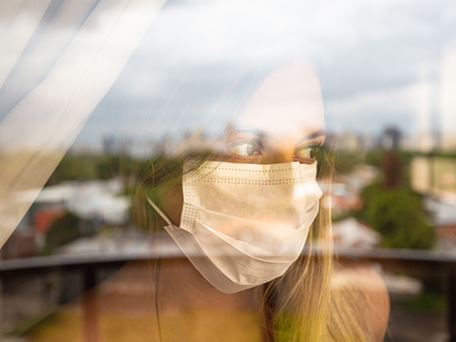 woman wearing a mask