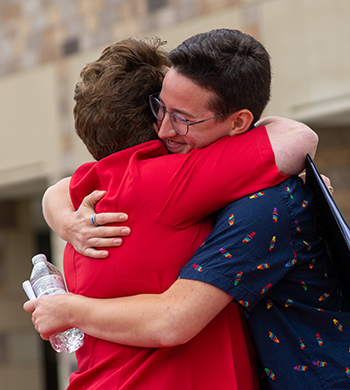 Reverend Sara Smith hugging Ben Greene