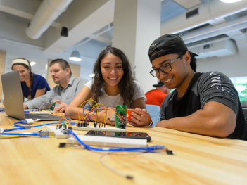 Engineering students working on a project