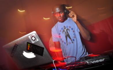 Ali Kaba DJing at an event